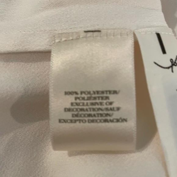 Ann Taylor| Petite |Cream with flare short sleeve. Peplum cut. Zipper back. - Picture 4 of 5